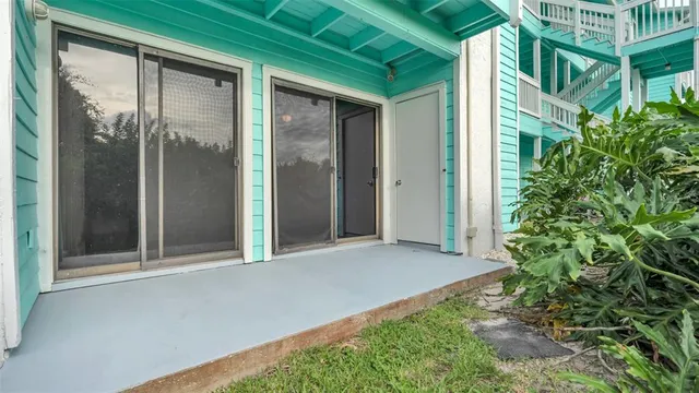 an aerial view of a house having yard and a play ground