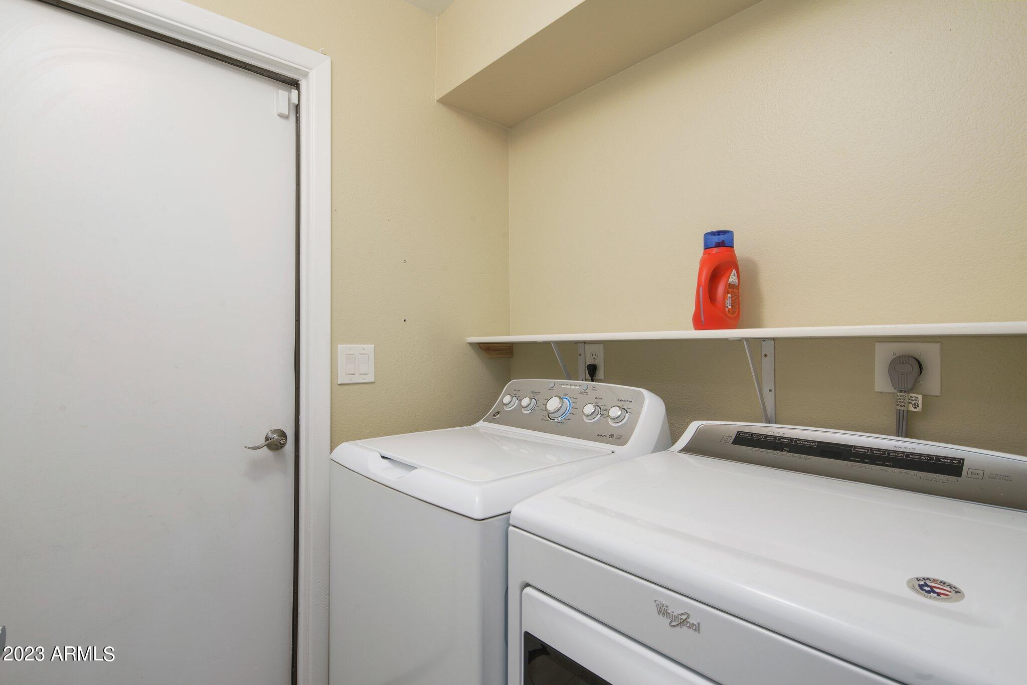6609 East Phelps Road Scottsdale, AZ 85254 - Photo 24 of 83 a utility room with dryer and washer