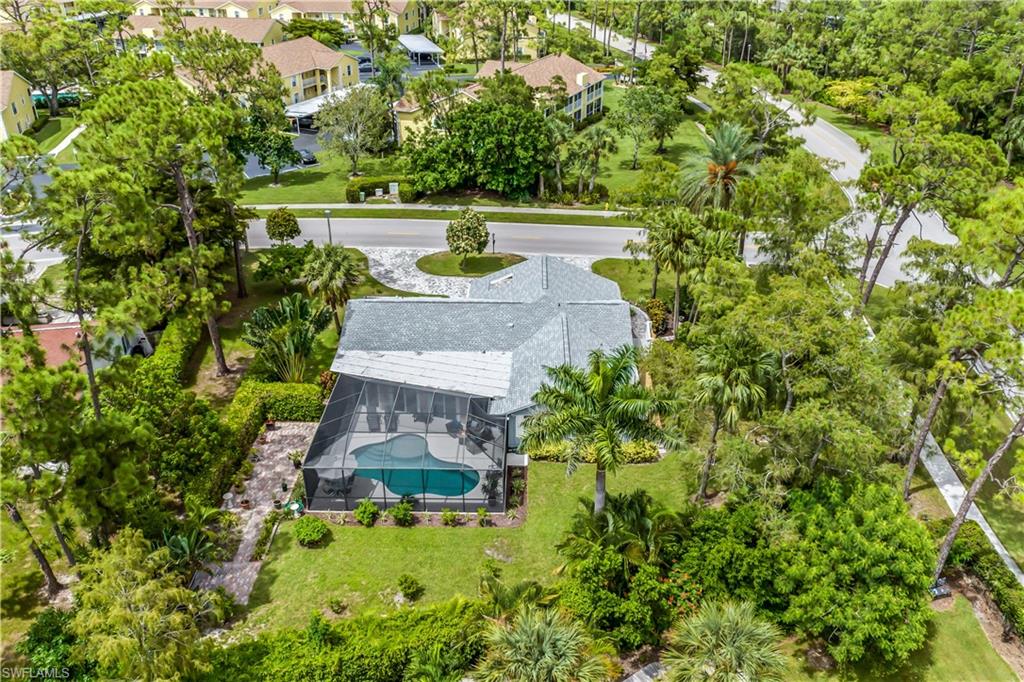 2232 Buckingham Lane Naples, FL 34112 - Photo 19 of 30 an aerial view of a house with yard swimming pool and outdoor seating