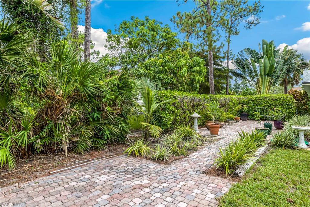 2232 Buckingham Lane Naples, FL 34112 - Photo 23 of 30 a view of a garden with plants