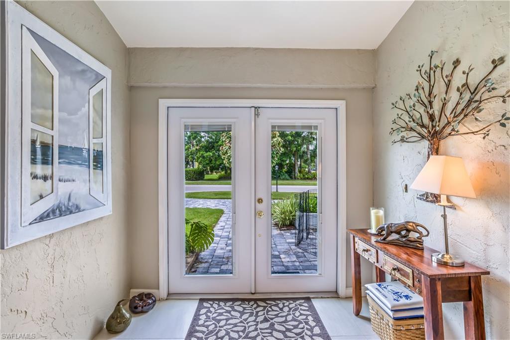 2232 Buckingham Lane Naples, FL 34112 - Photo 4 of 30 a view of a workspace with furniture and a window