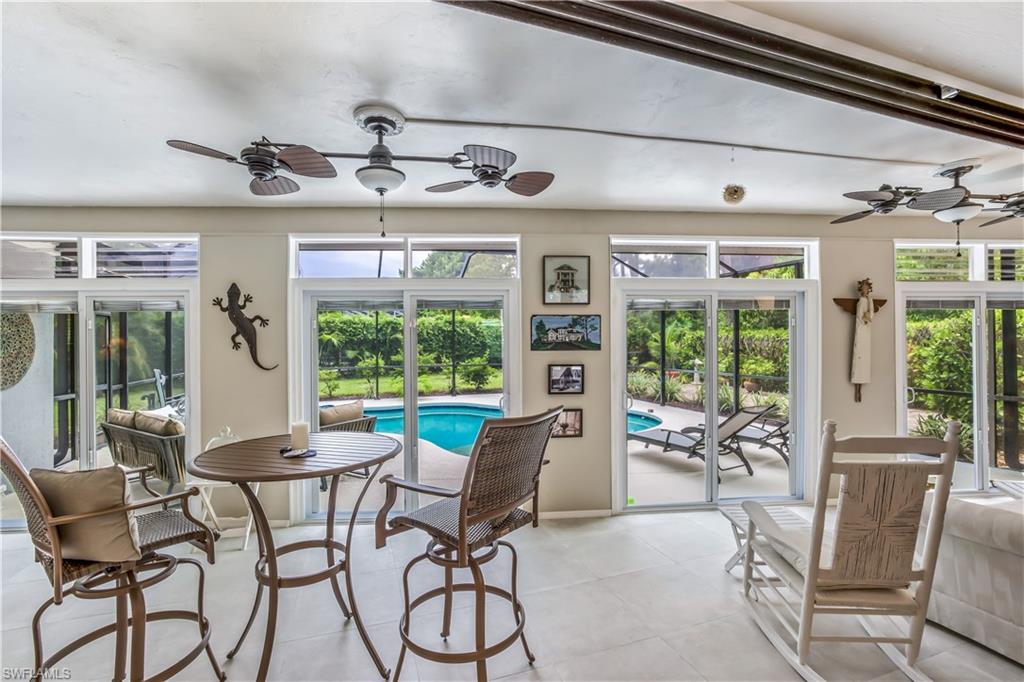 2232 Buckingham Lane Naples, FL 34112 - Photo 6 of 30 a view of a dining room with furniture window and outside view