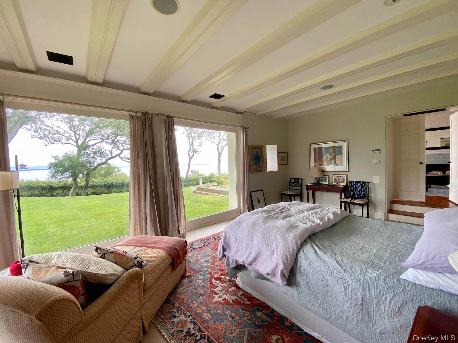 2840 Stars Road East Marion, NY 11939 - Photo 14 of 18 Bedroom with beamed ceiling