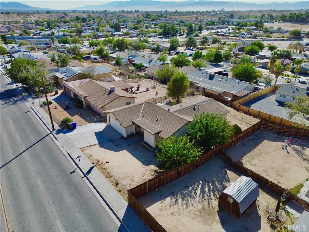 16403 Seneca Road Victorville, CA 92395 - Photo 33 of 47 an aerial view of a house with swimming pool