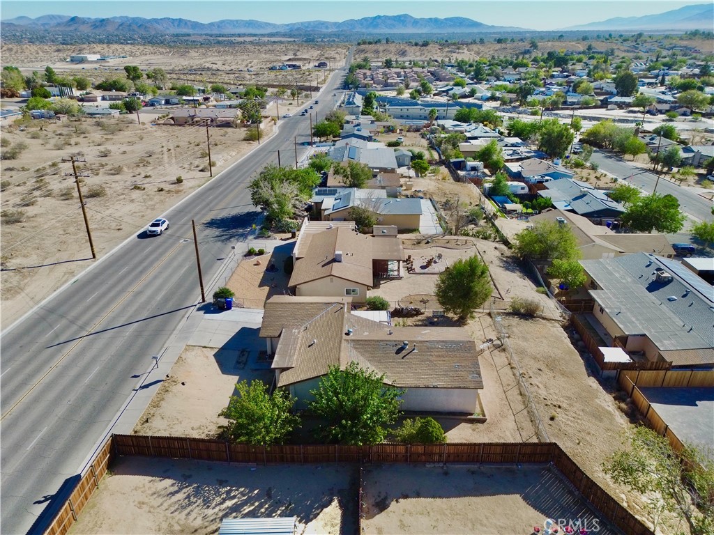 16403 Seneca Road Victorville, CA 92395 - Photo 37 of 47 an aerial view of residential houses with outdoor space