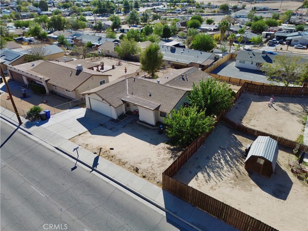 16403 Seneca Road Victorville, CA 92395 - Photo 39 of 47 an aerial view of a house with a yard and lake view