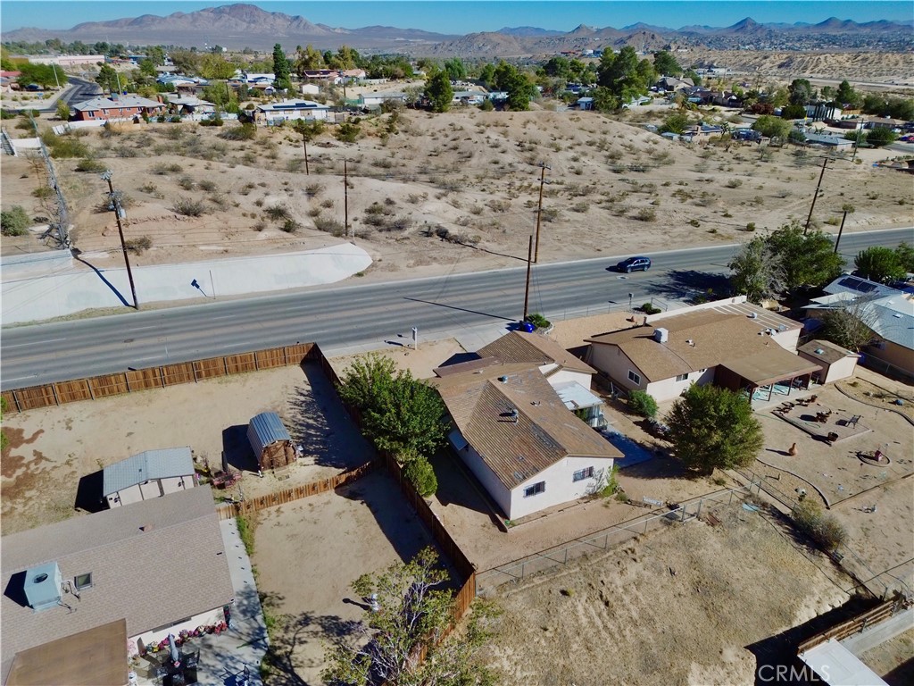 16403 Seneca Road Victorville, CA 92395 - Photo 46 of 47 an aerial view of residential houses with outdoor space