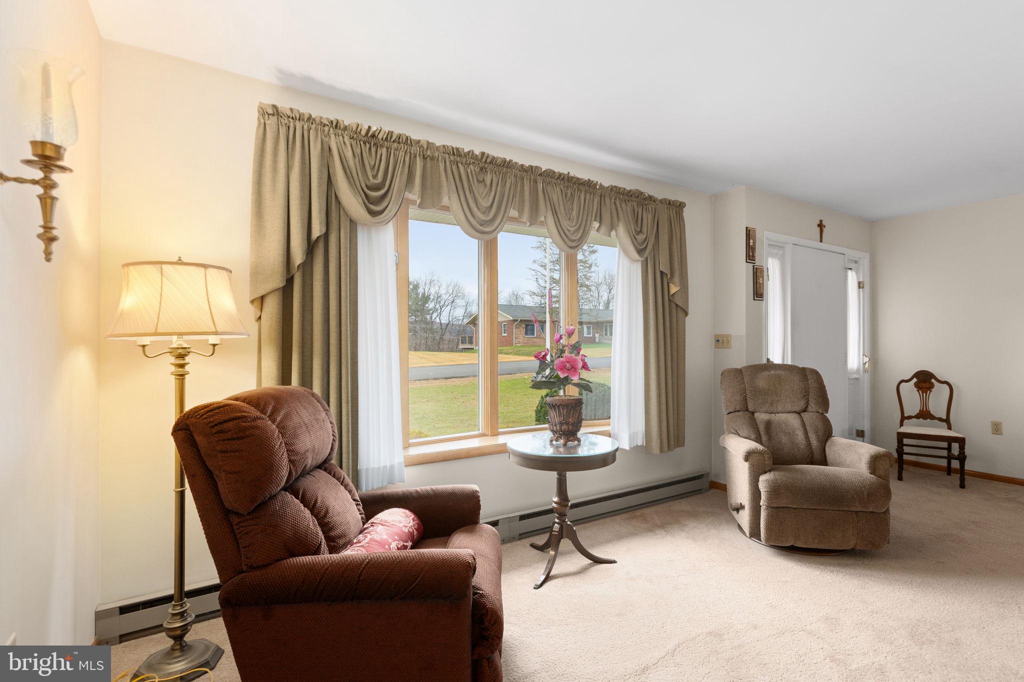 201 Arlene Street Minersville, PA 17954 - Photo 11 of 31 a living room with furniture and a large window