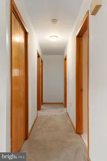 a view of hallway with stairs