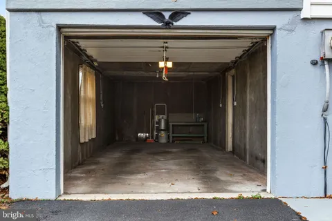 a view of a hallway view with furniture