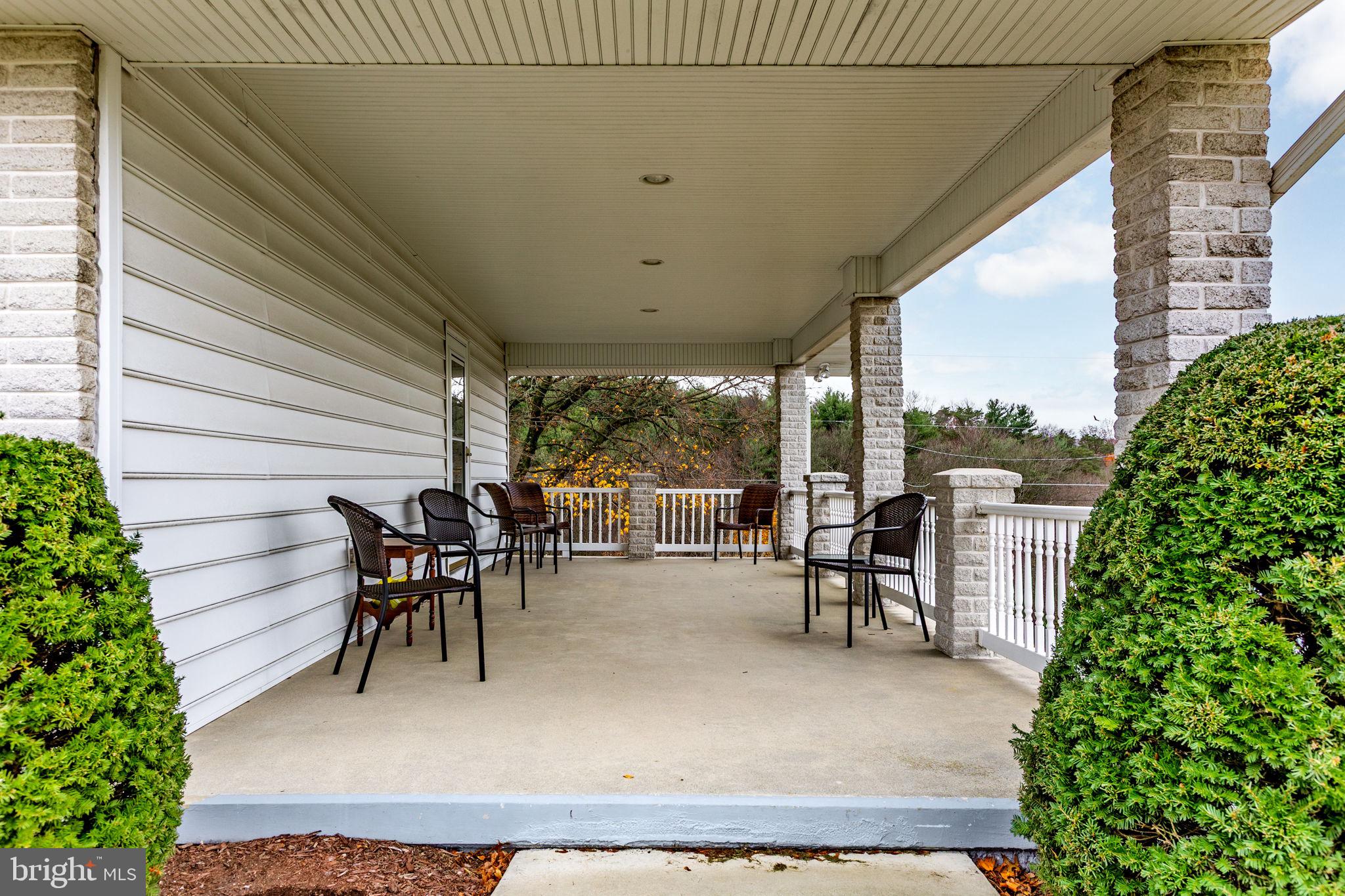 201 Arlene Street Minersville, PA 17954 - Photo 5 of 31 a dining room with furniture and a garden