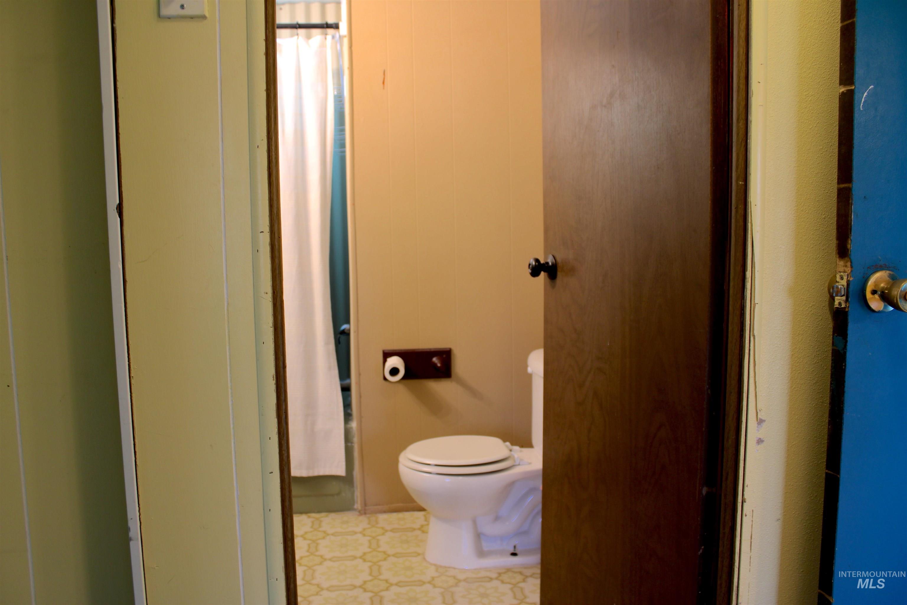 15881 Purple Sage Road, Unit 3 Caldwell, ID 83607 - Photo 16 of 29 Bathroom featuring light flooring and toilet