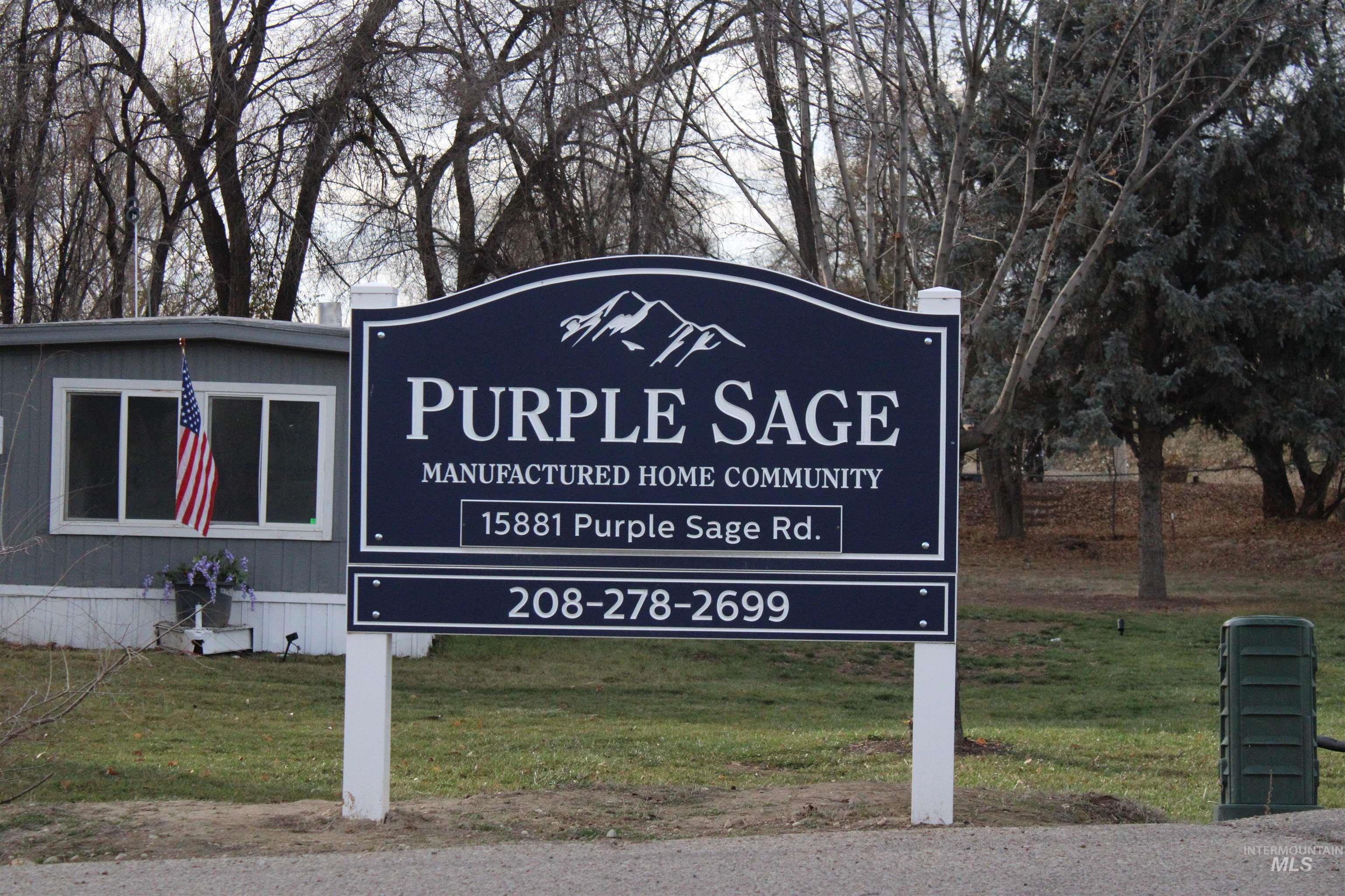 15881 Purple Sage Road, Unit 3 Caldwell, ID 83607 - Photo 28 of 29 Community / neighborhood sign featuring a lawn