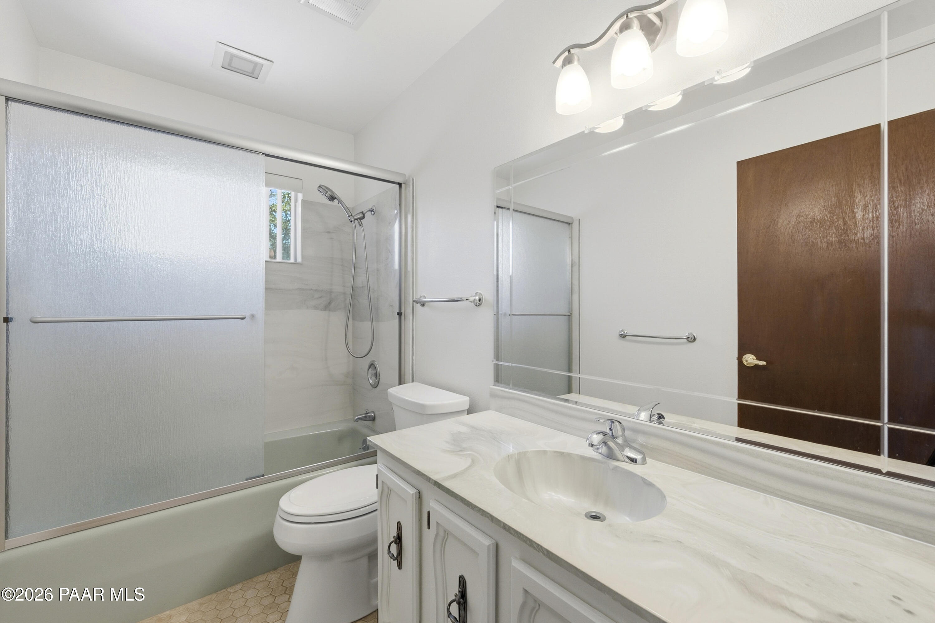 1775 Grandview Road Prescott, AZ 86305 - Photo 21 of 42 a bathroom with a sink toilet and shower