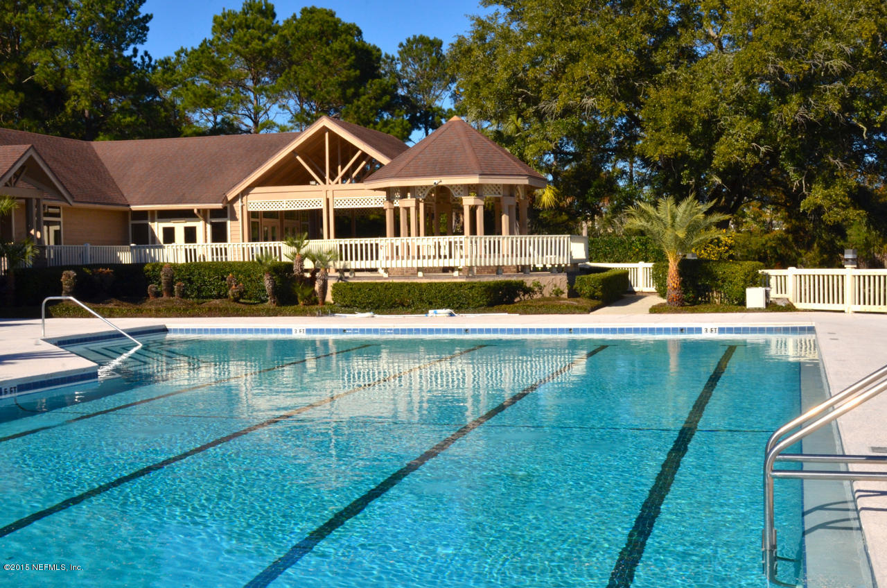 405 Tournament Road Ponte Vedra, FL 32082 - Photo 29 of 31 a front view of a house with swimming pool