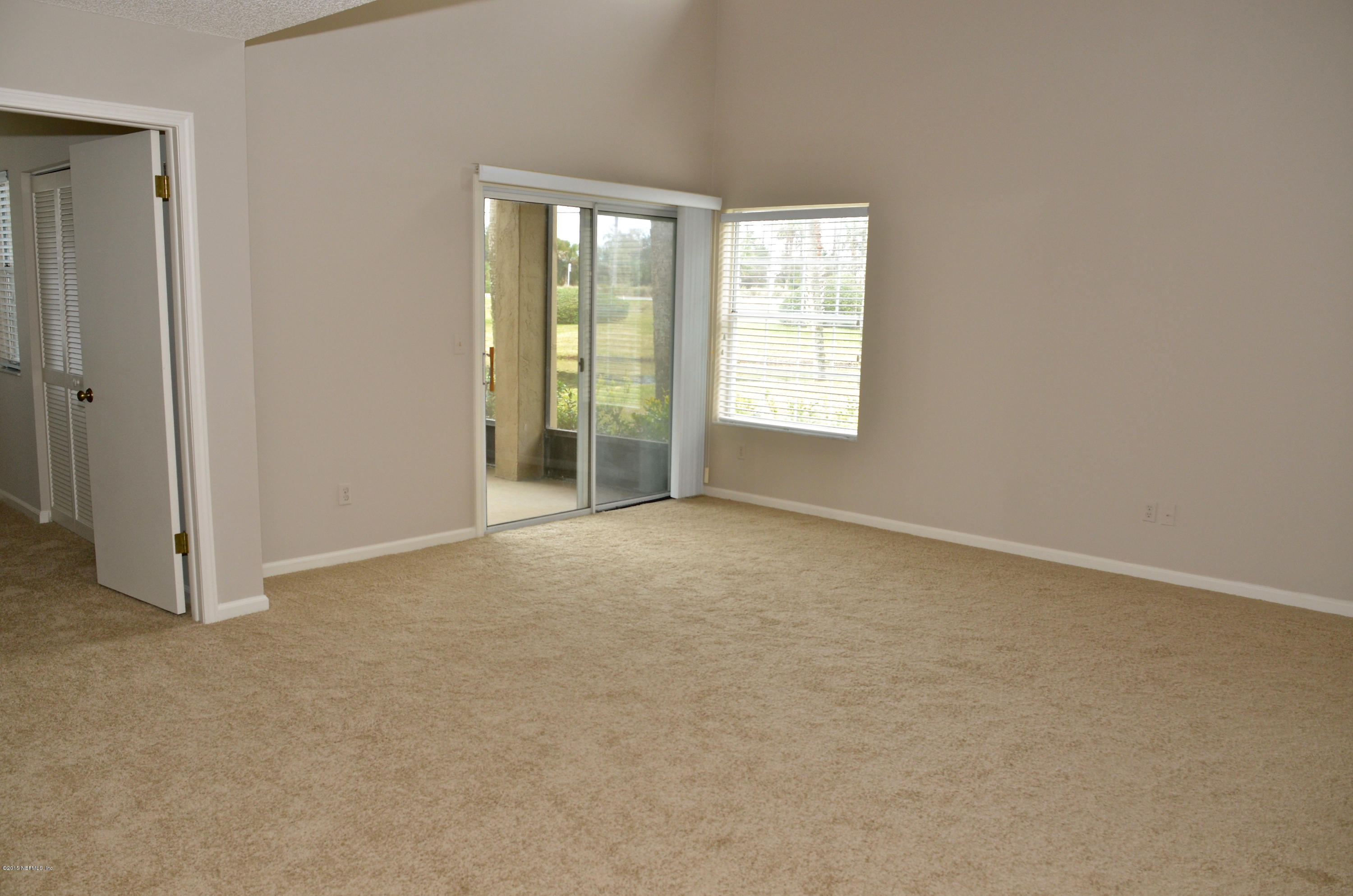 405 Tournament Road Ponte Vedra, FL 32082 - Photo 5 of 31 an empty room with windows