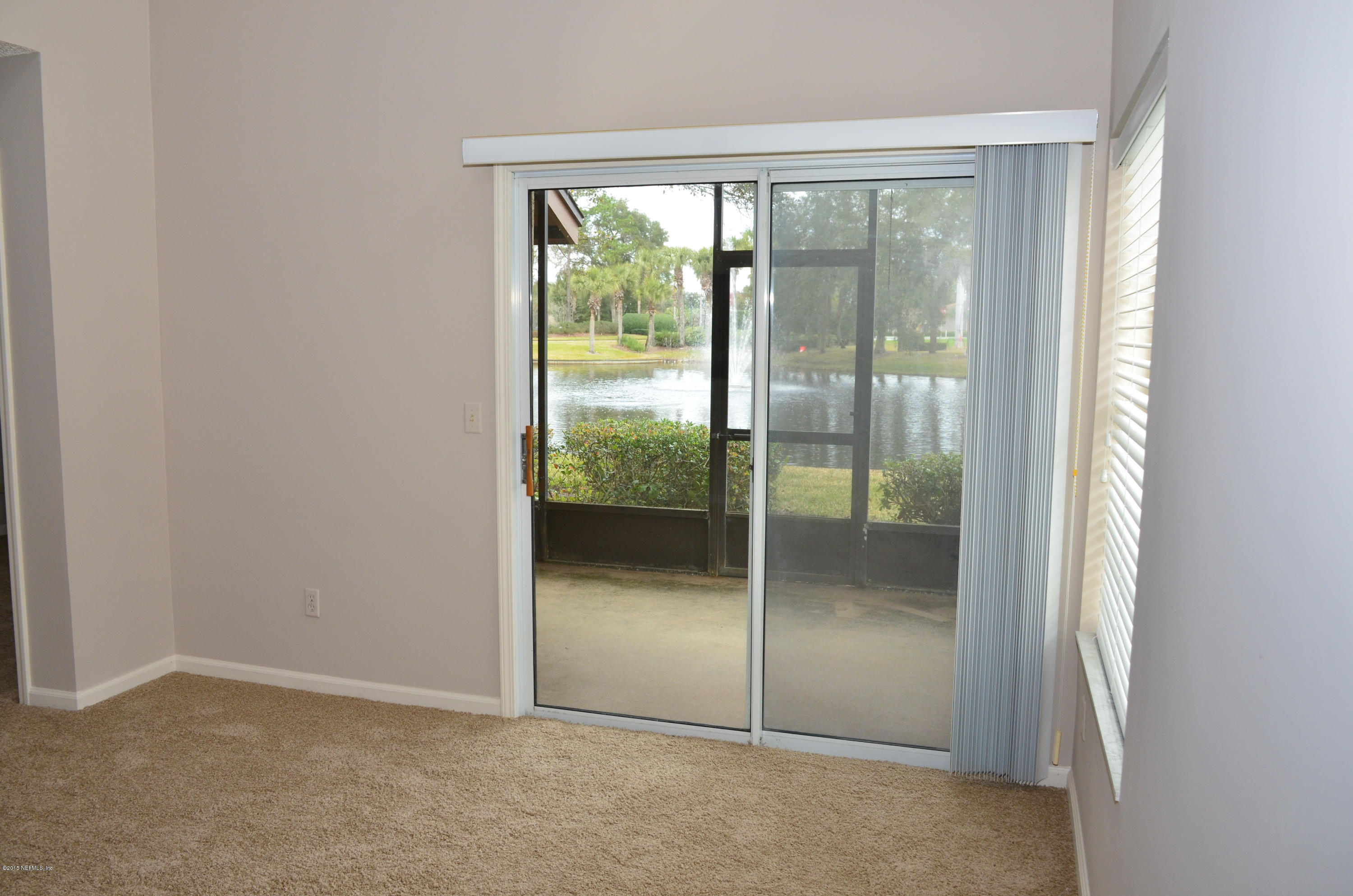 405 Tournament Road Ponte Vedra, FL 32082 - Photo 6 of 31 an empty room and glass door
