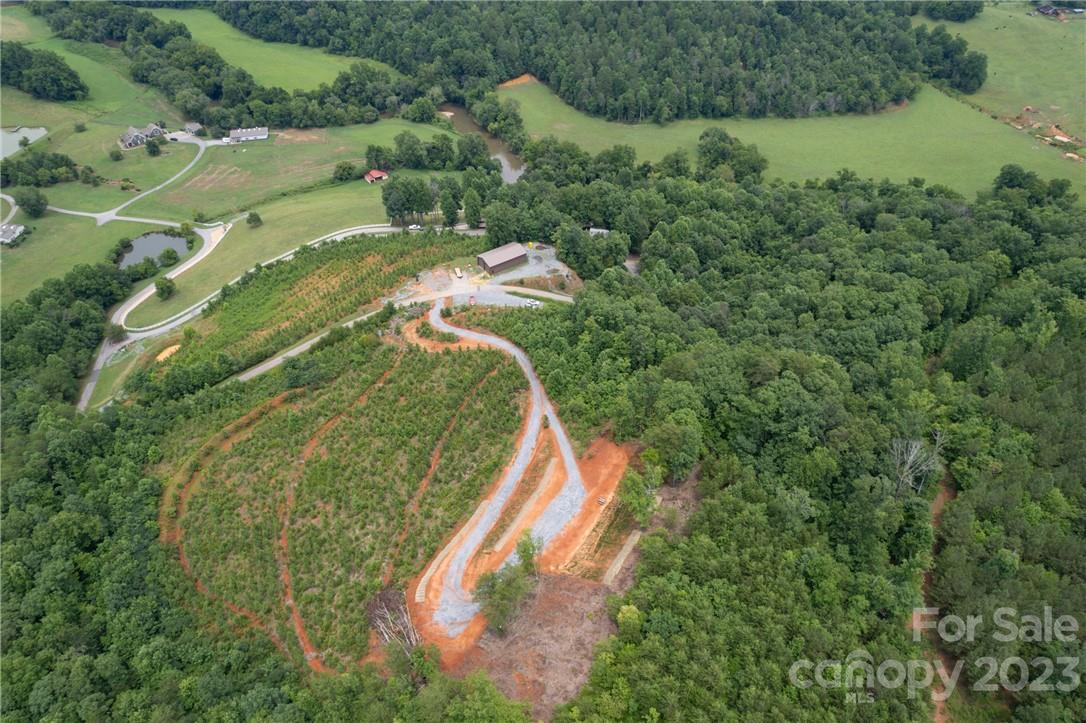 Tract #6 V S Dalton Road Rutherfordton, NC 28139 - Photo 9 of 33 an aerial view of residential house with outdoor space and trees all around