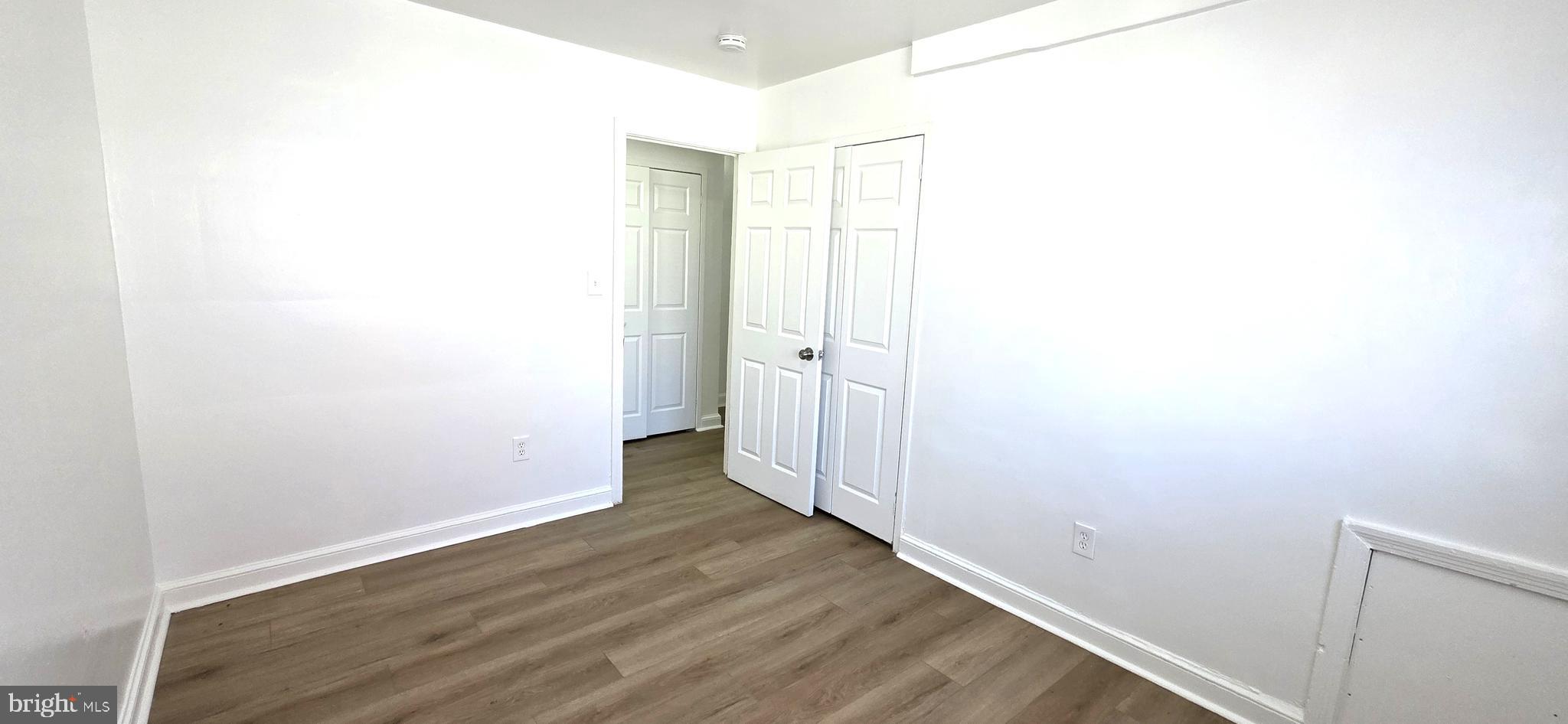 3207 11th Place Southeast, Unit 4 Washington, DC 20032 - Photo 9 of 16 a view of a room with wooden floor