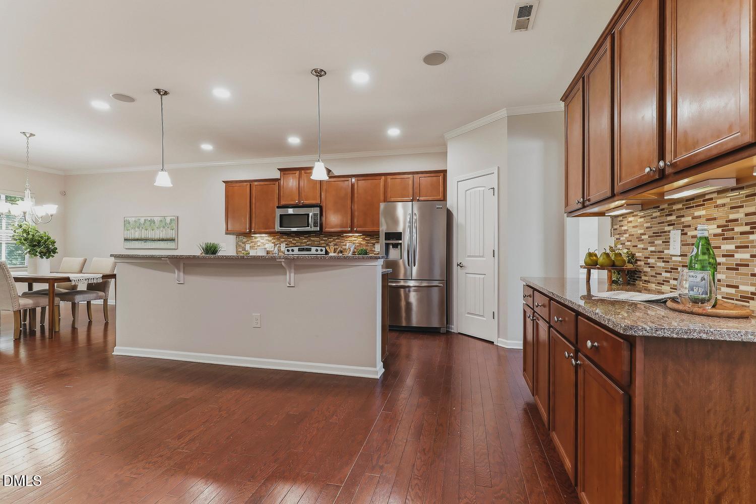 3336 Althorp Drive Raleigh, NC 27616 - Photo 9 of 87 011-031-KitchenBreakfast Bar-1500x1000