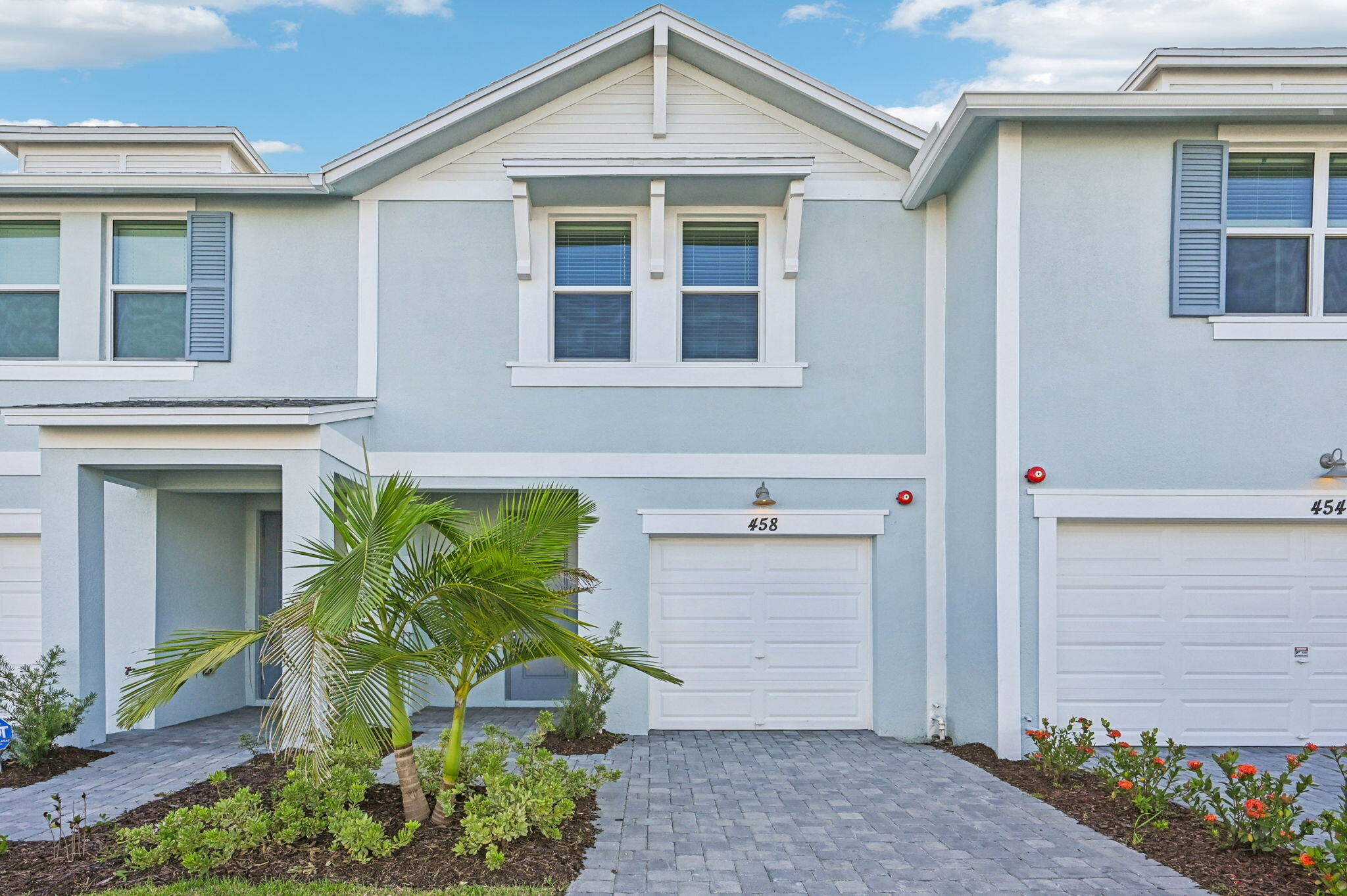 458 Salisbury Circle Fort Pierce, FL 34982 - Photo 1 of 32 a front view of a house with garden