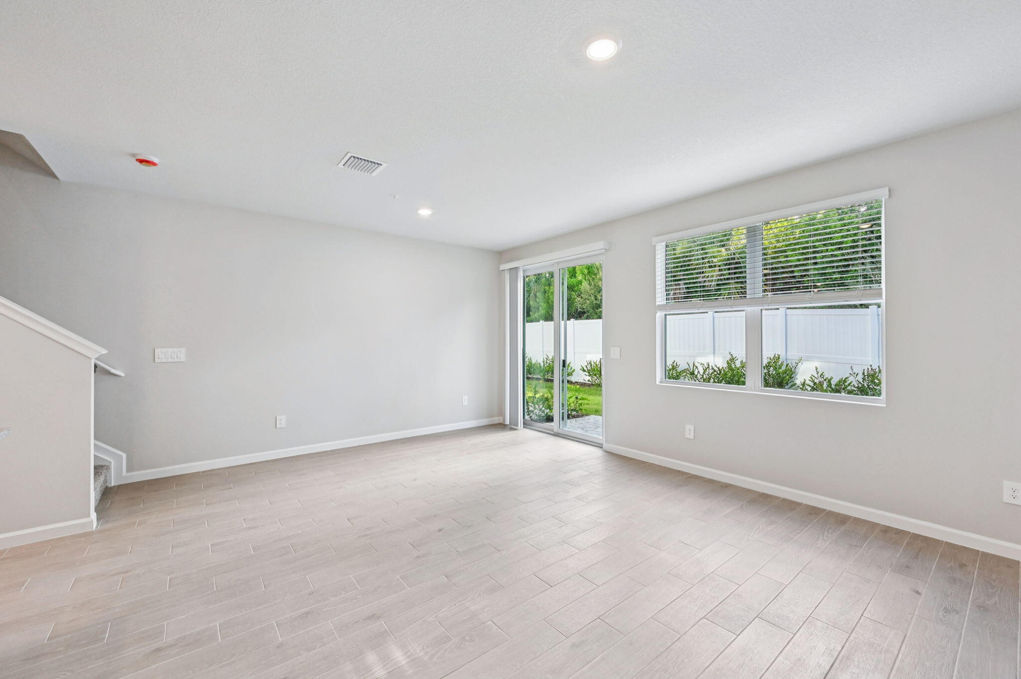 458 Salisbury Circle Fort Pierce, FL 34982 - Photo 14 of 32 a view of an empty room with a window