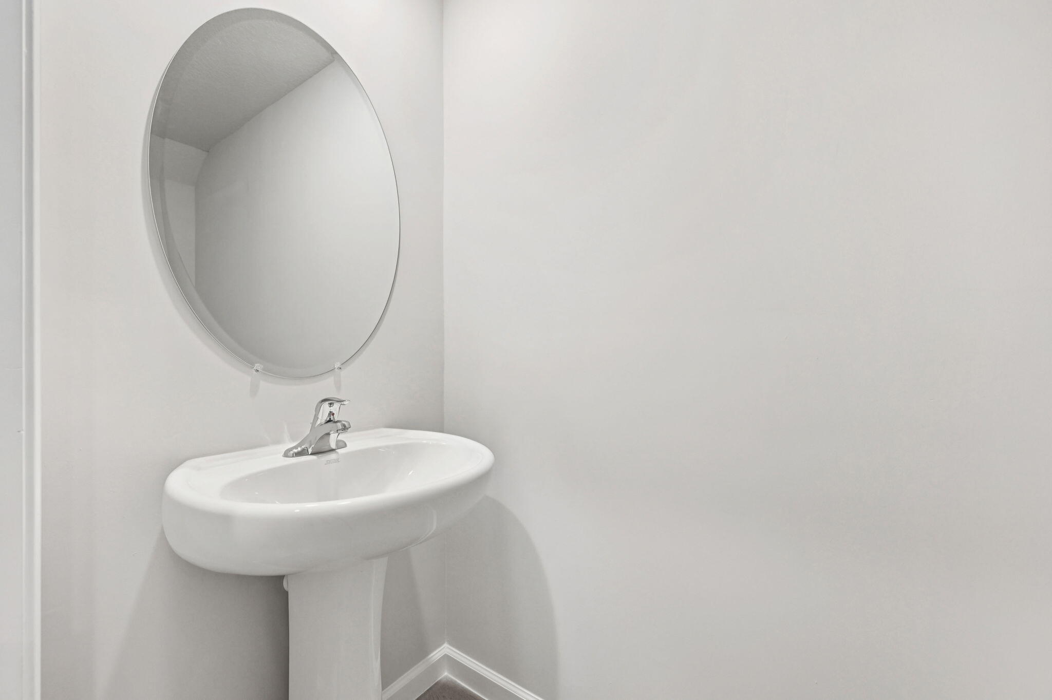 458 Salisbury Circle Fort Pierce, FL 34982 - Photo 16 of 32 a bathroom with a sink and a mirror