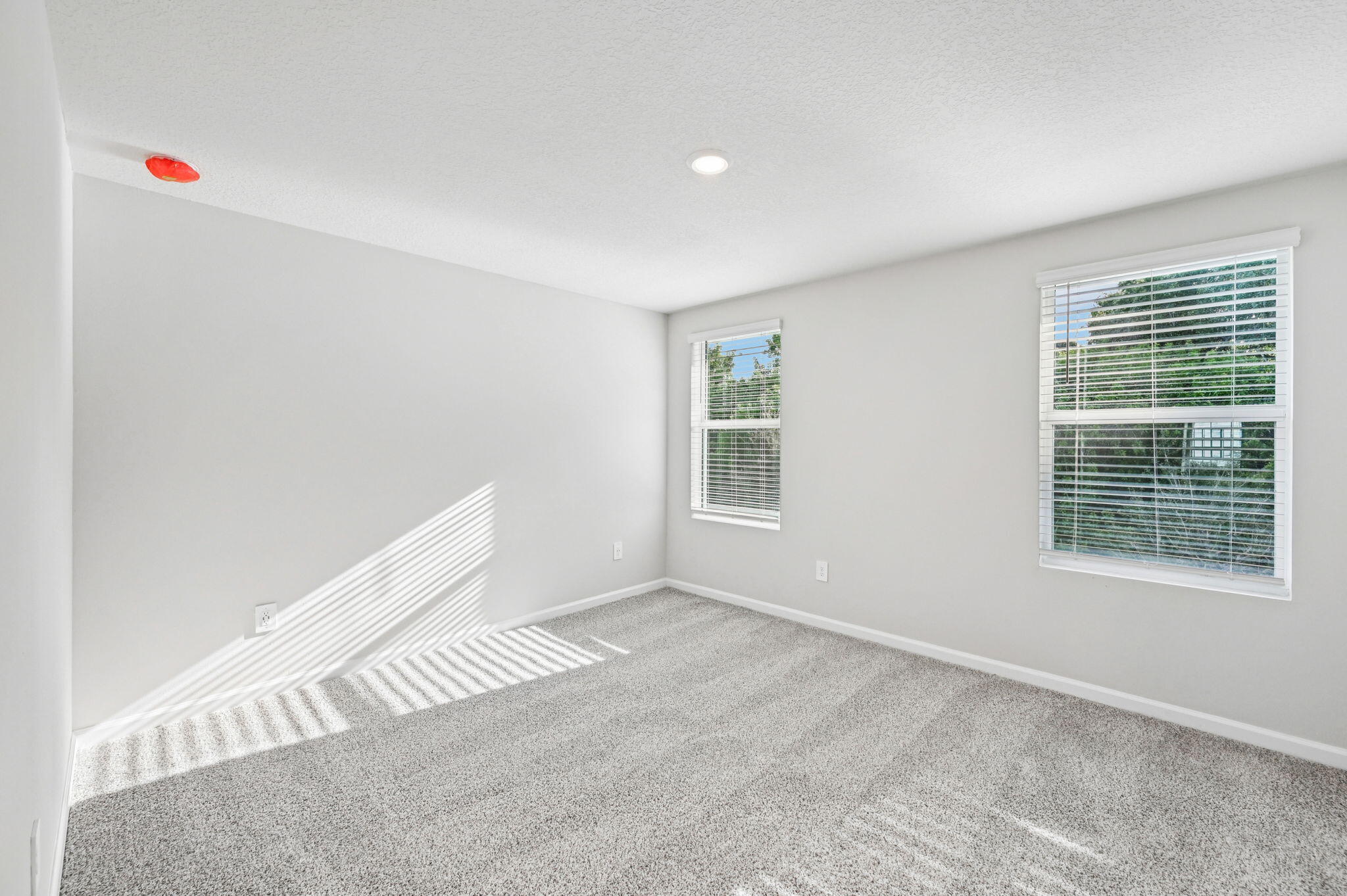 458 Salisbury Circle Fort Pierce, FL 34982 - Photo 17 of 32 a view of an empty room with a window