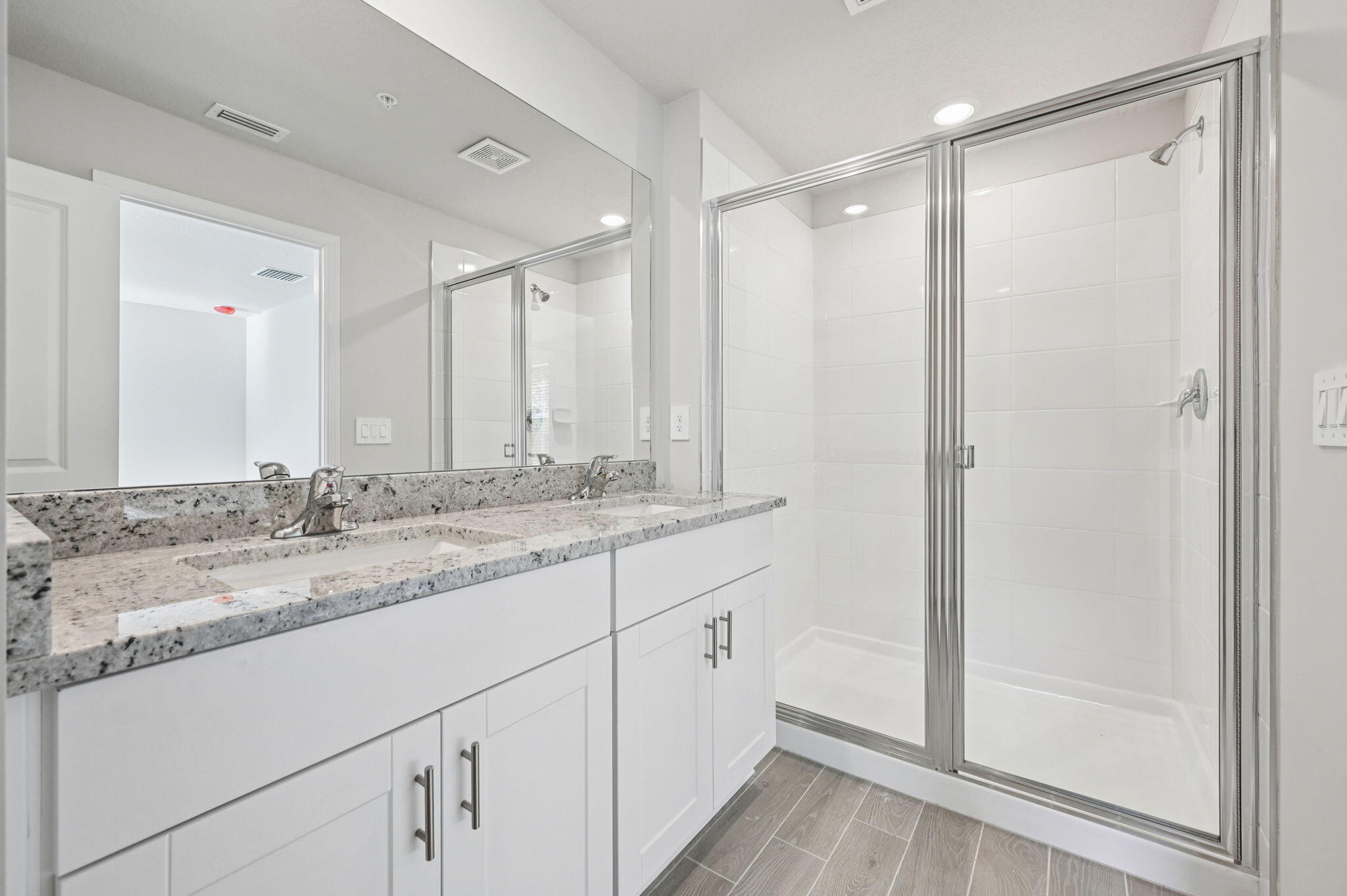 458 Salisbury Circle Fort Pierce, FL 34982 - Photo 20 of 32 a bathroom with a granite countertop sink and a mirror