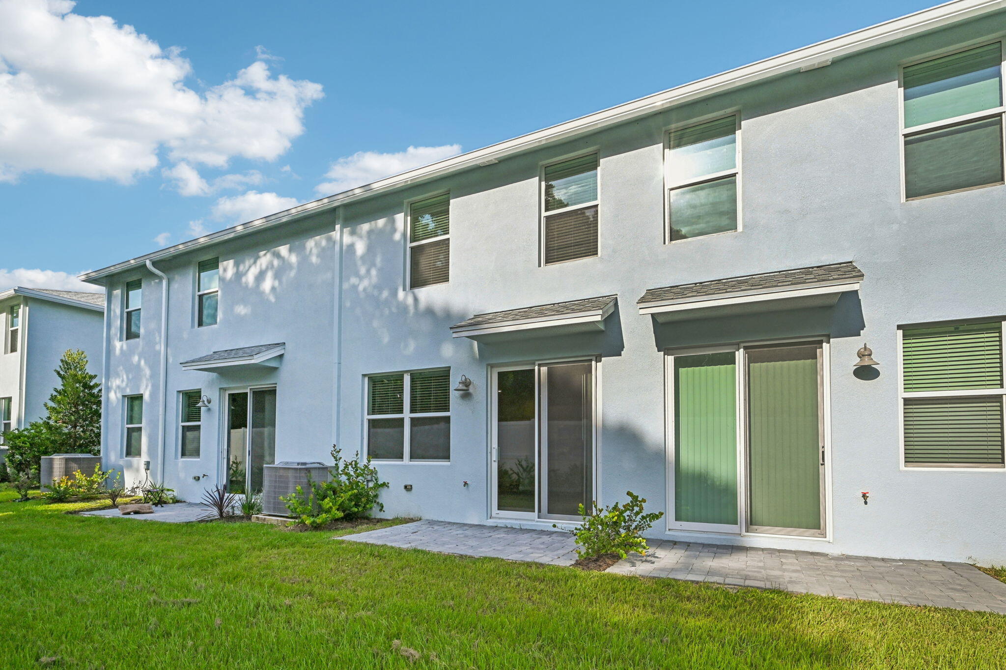 458 Salisbury Circle Fort Pierce, FL 34982 - Photo 28 of 32 front view of a house with a yard