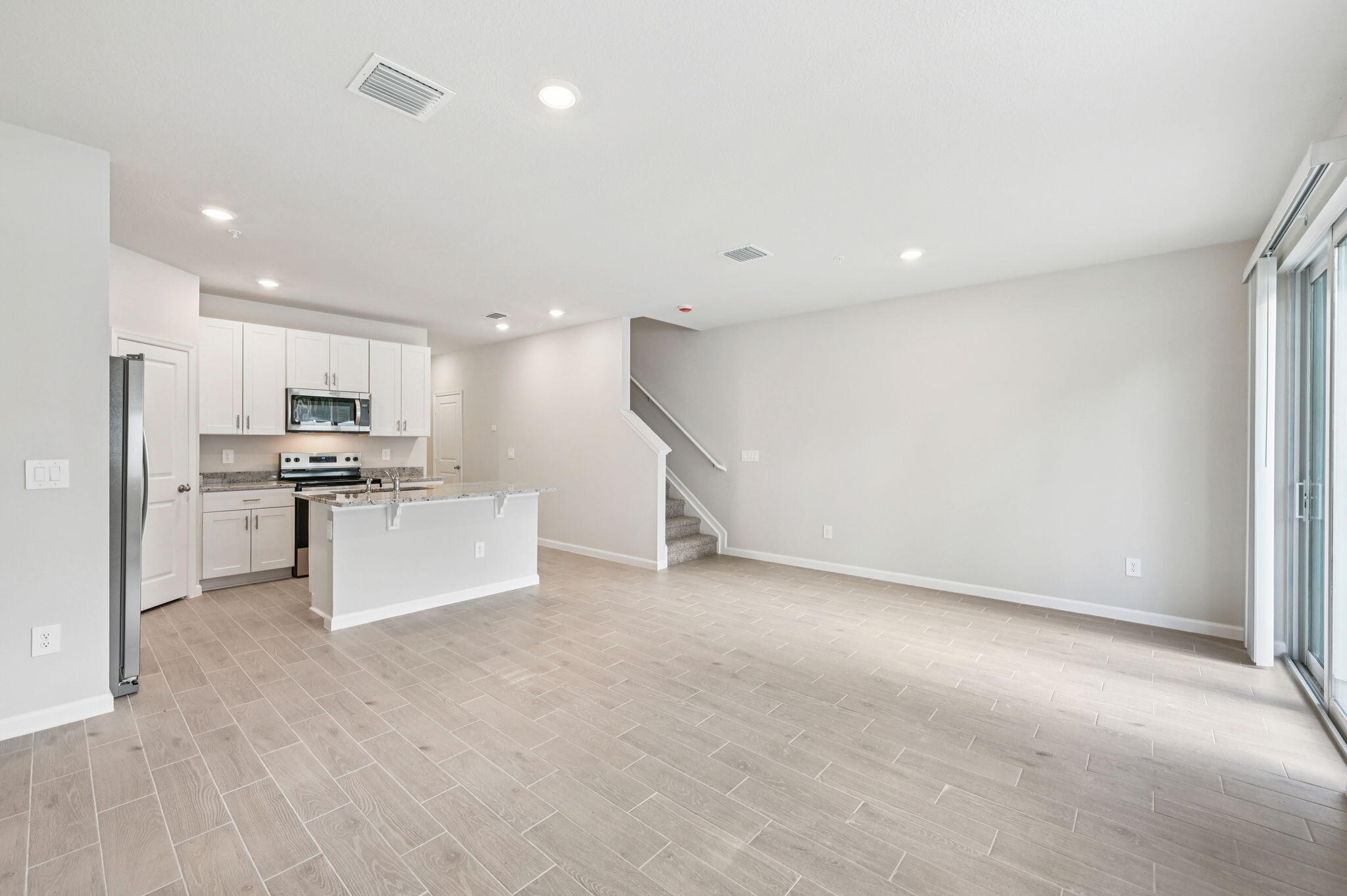 458 Salisbury Circle Fort Pierce, FL 34982 - Photo 10 of 32 a view of kitchen with refrigerator sink and microwave