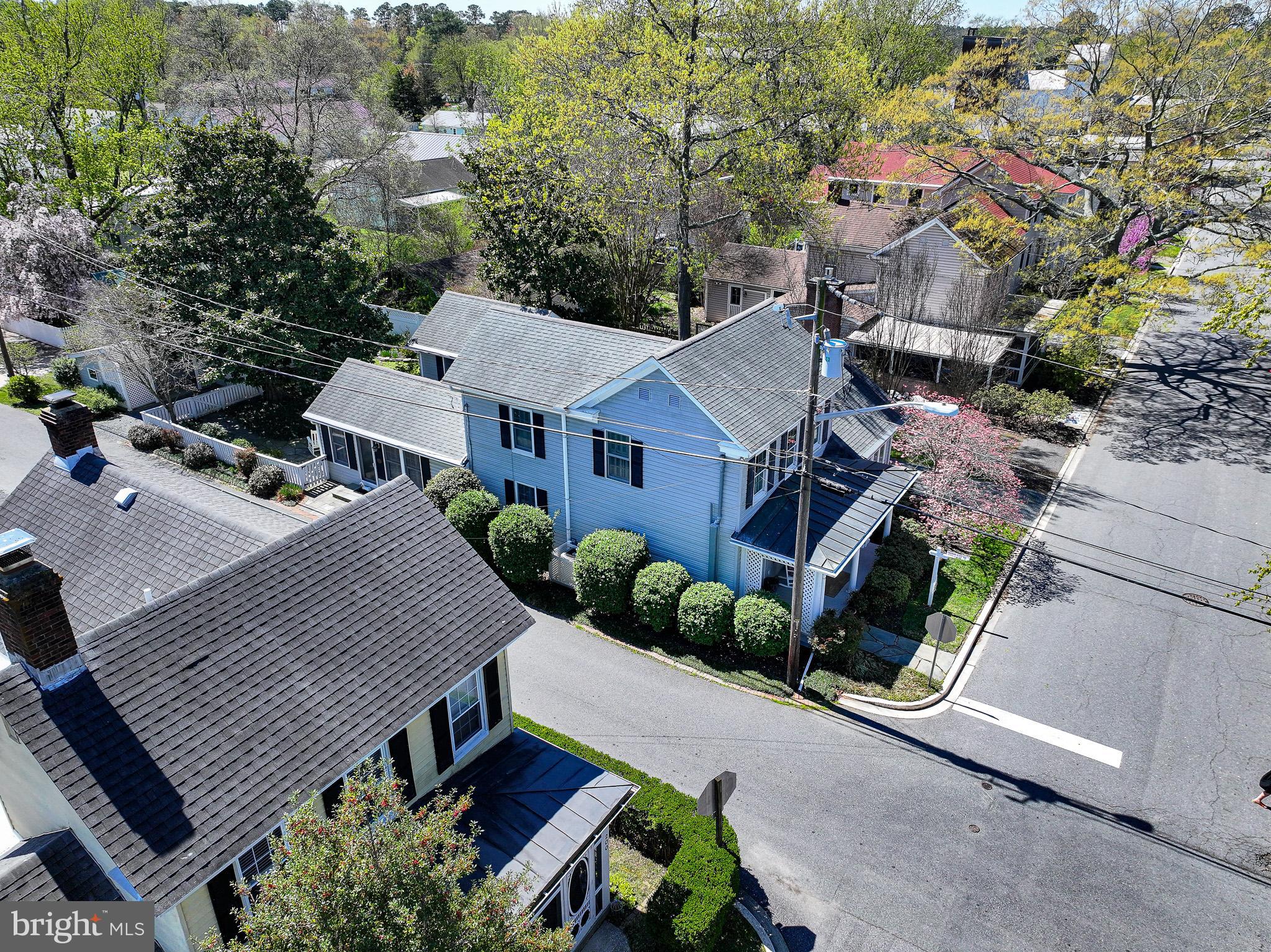 114 East Chew Avenue St. Michaels, MD 21663 - Photo 57 of 57 an aerial view of a house with garden space and street view