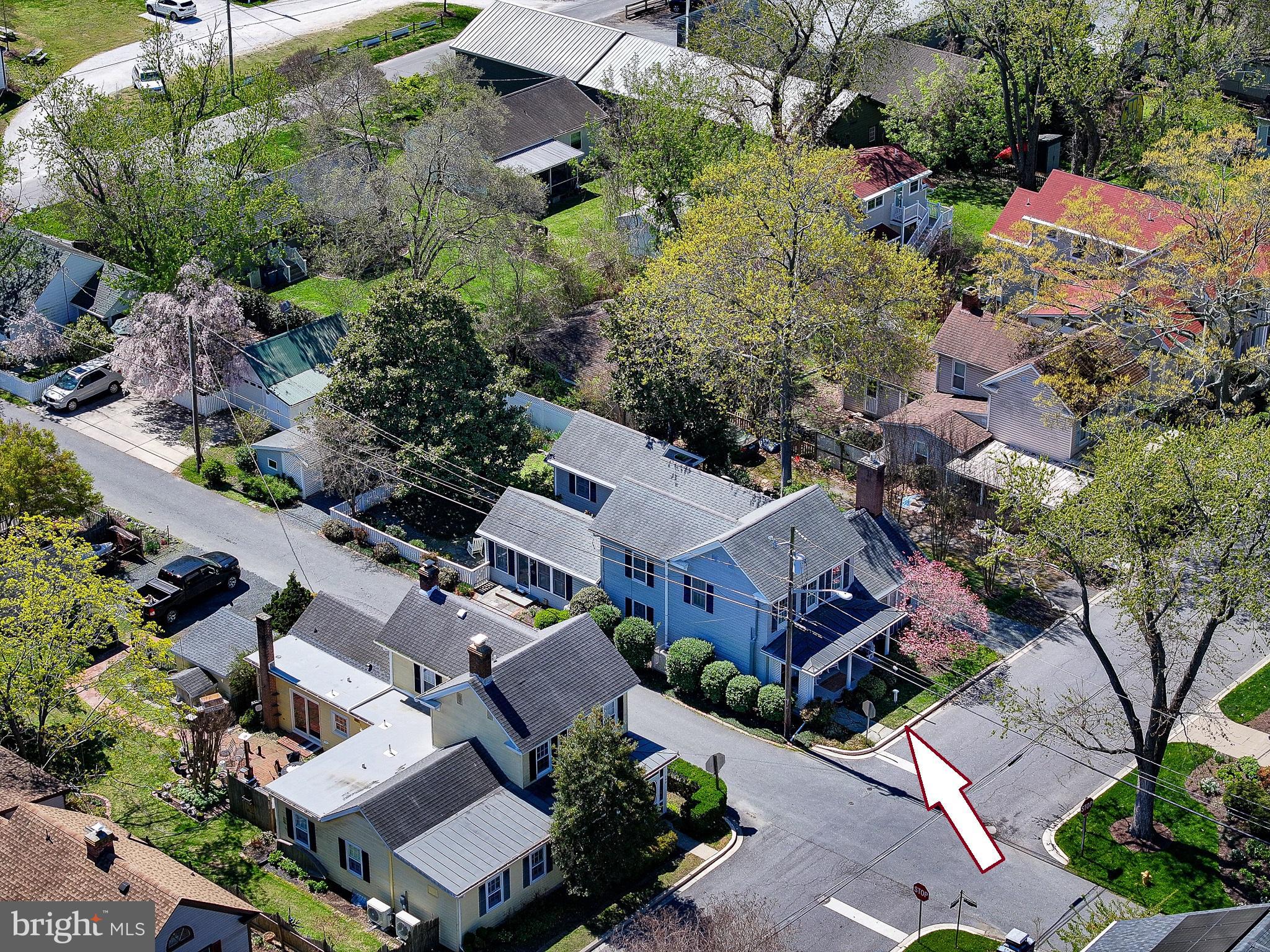 114 East Chew Avenue St. Michaels, MD 21663 - Photo 6 of 57 an aerial view of multiple houses with yard