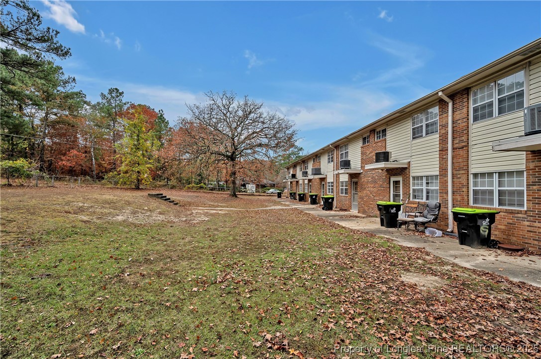 302 Law Road, Unit A Fayetteville, NC 28311 - Photo 8 of 8 a street view with large trees