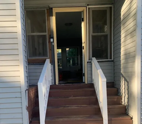 a view of a entryway of a house with stairs