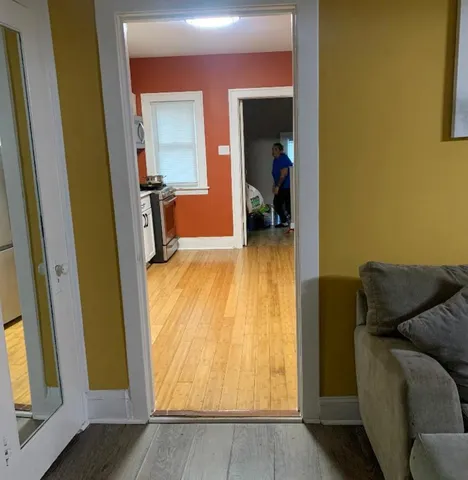 a view of living room with furniture and a window