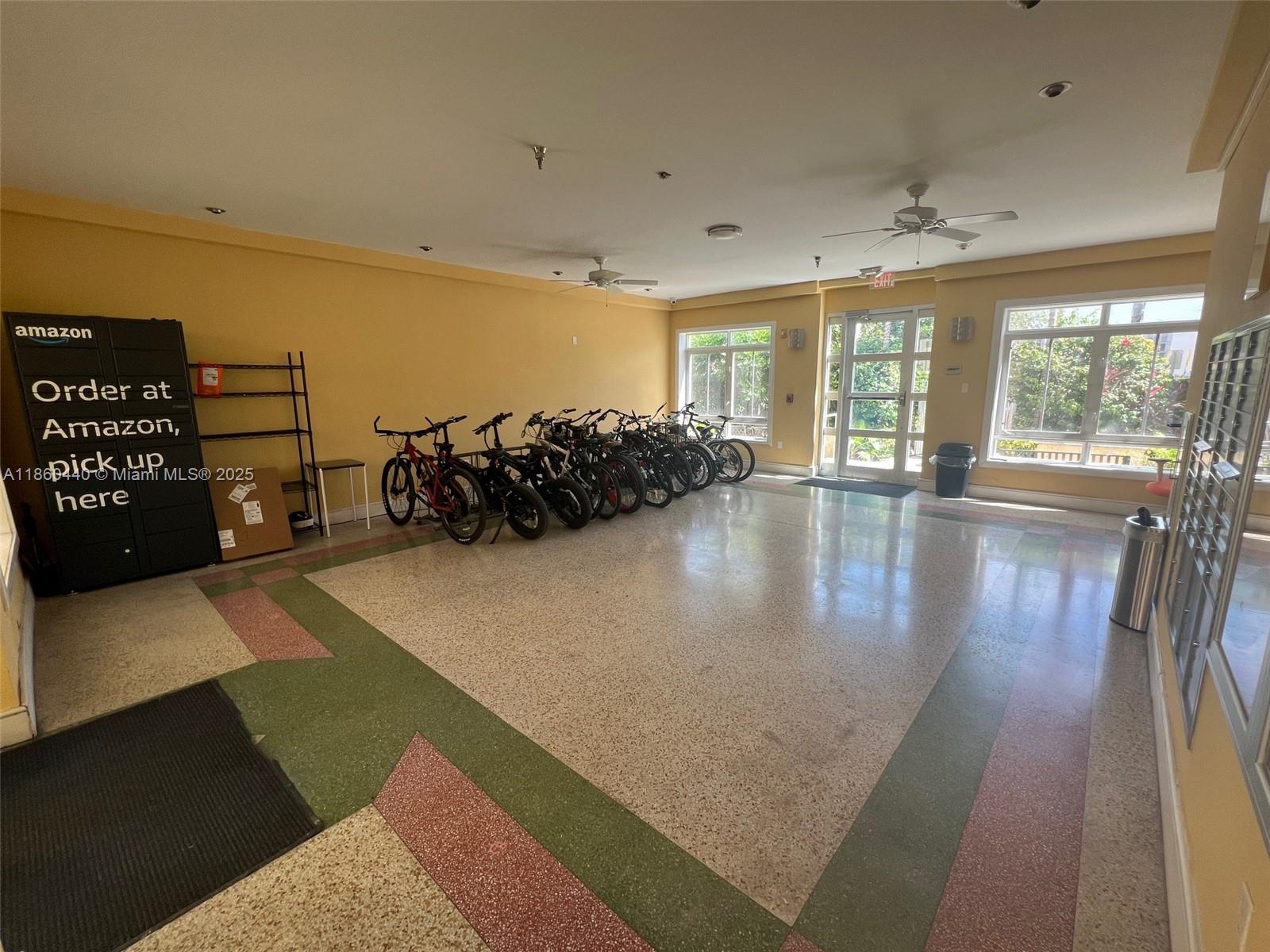 1308 Drexel Avenue, Unit 103 Miami Beach, FL 33139 - Photo 12 of 37 a view of a hall with wooden floor