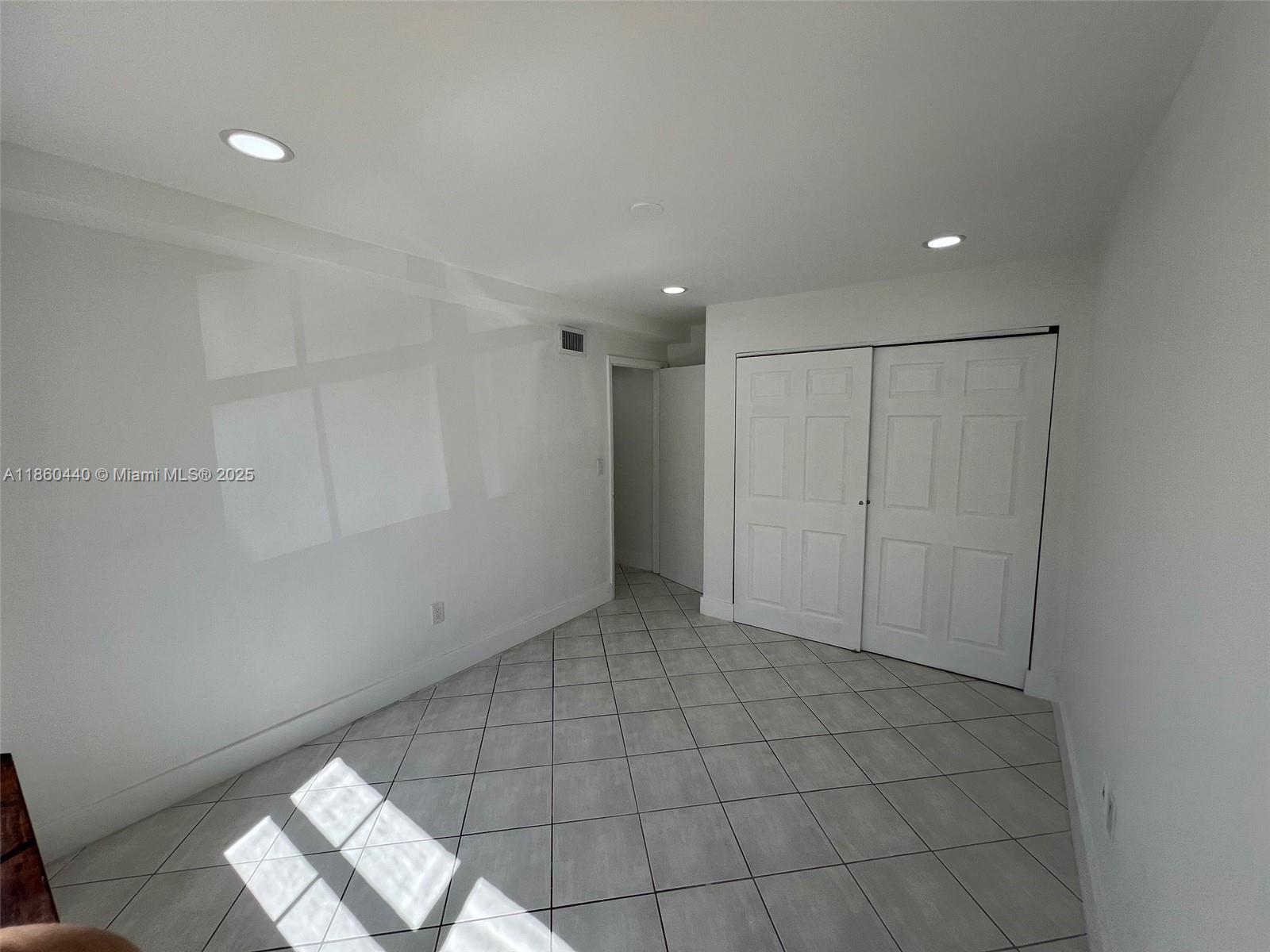 1308 Drexel Avenue, Unit 103 Miami Beach, FL 33139 - Photo 27 of 37 a view of an empty room
