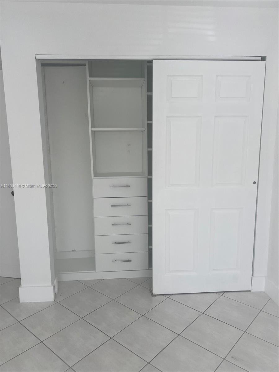 1308 Drexel Avenue, Unit 103 Miami Beach, FL 33139 - Photo 28 of 37 an empty room