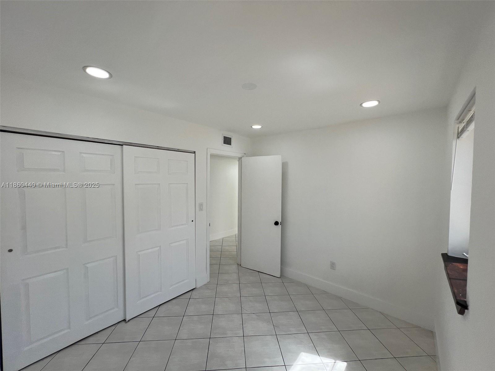1308 Drexel Avenue, Unit 103 Miami Beach, FL 33139 - Photo 30 of 37 a view of a hallway