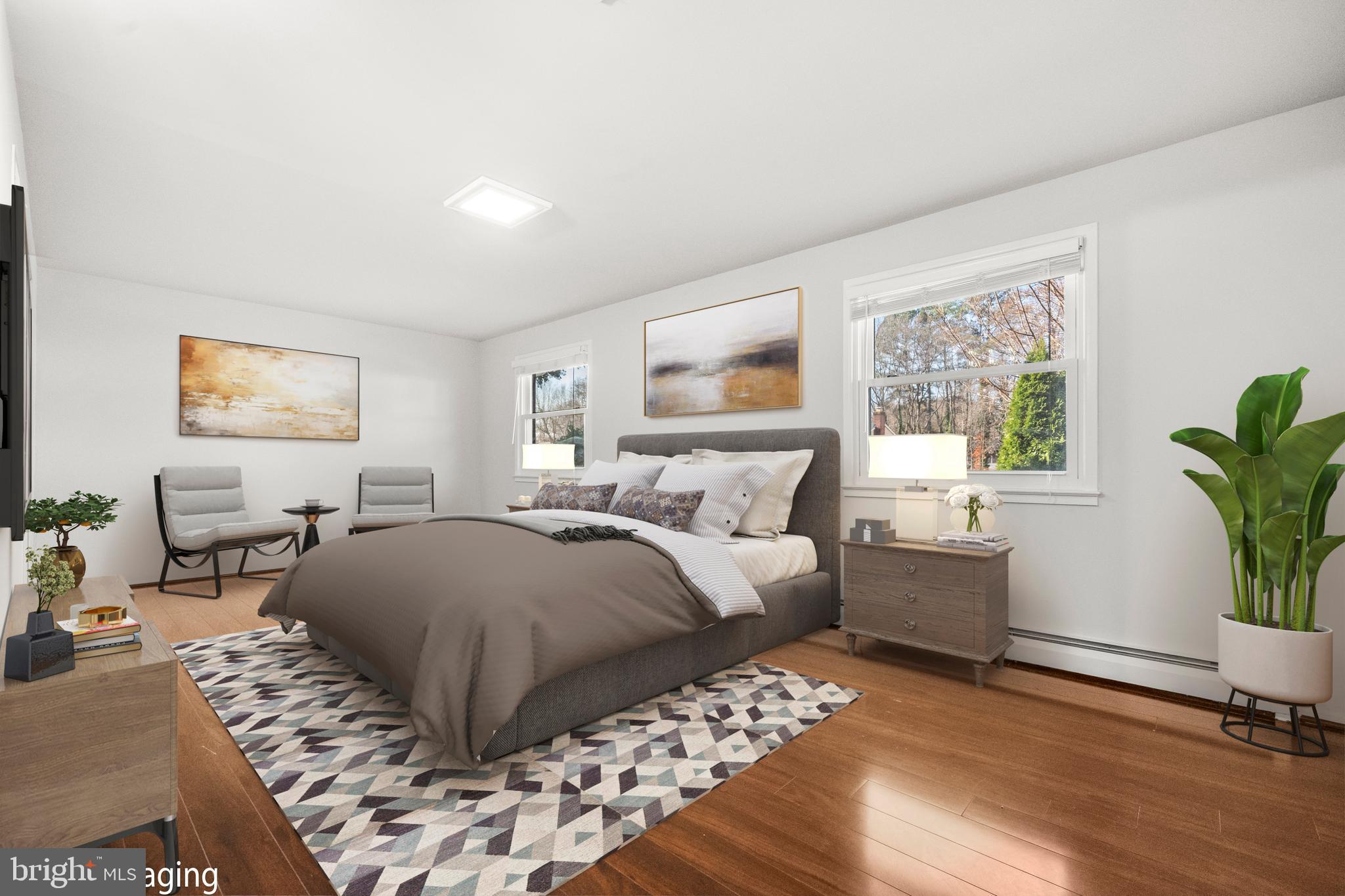 13411 Kerrydale Road Woodbridge, VA 22193 - Photo 12 of 44 a bedroom with a large bed and windows