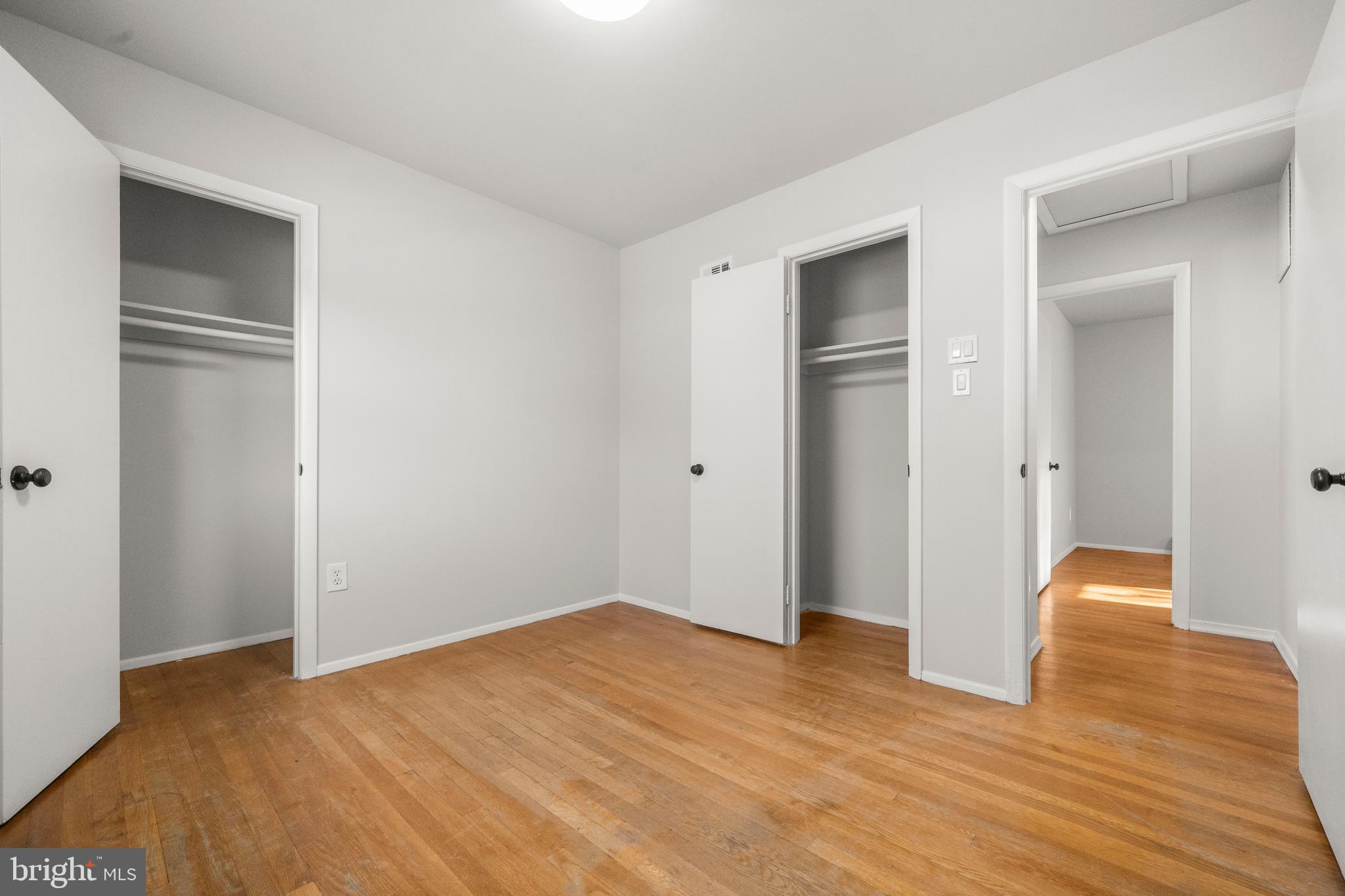 13411 Kerrydale Road Woodbridge, VA 22193 - Photo 18 of 44 a view of empty room with wooden floor