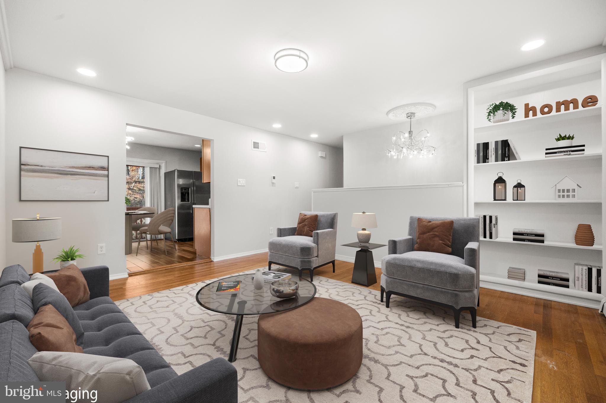 13411 Kerrydale Road Woodbridge, VA 22193 - Photo 3 of 44 a living room with furniture and a wooden floor