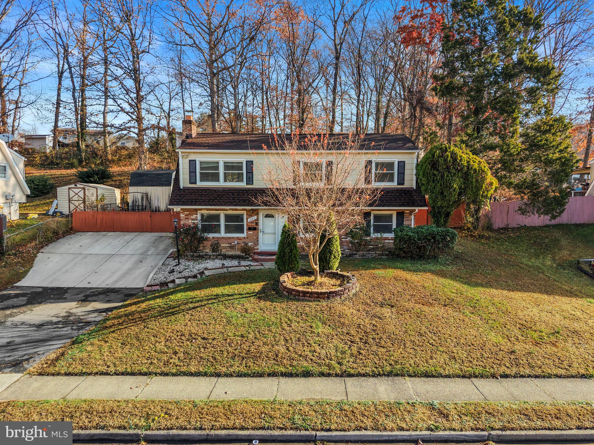 13411 Kerrydale Road Woodbridge, VA 22193 - Photo 34 of 44 a front view of a house with a yard