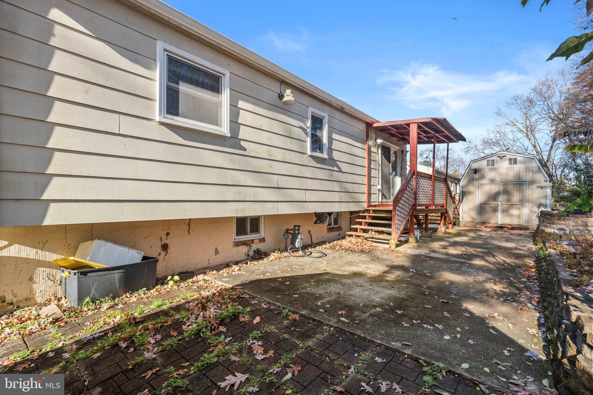 13411 Kerrydale Road Woodbridge, VA 22193 - Photo 39 of 44 a front view of a house with a yard