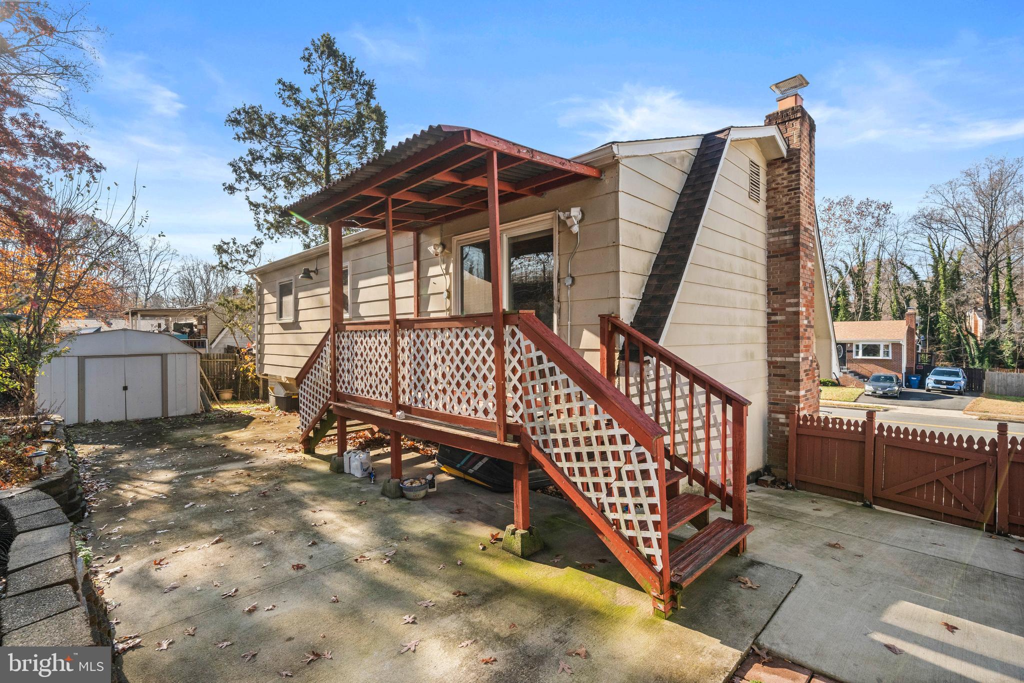 13411 Kerrydale Road Woodbridge, VA 22193 - Photo 41 of 44 a view of a roof deck with wooden fence and a couch