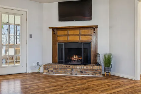 a kitchen with stainless steel appliances granite countertop a refrigerator sink and stove