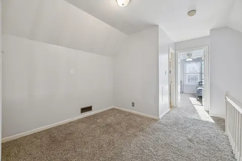 a living room with furniture and window