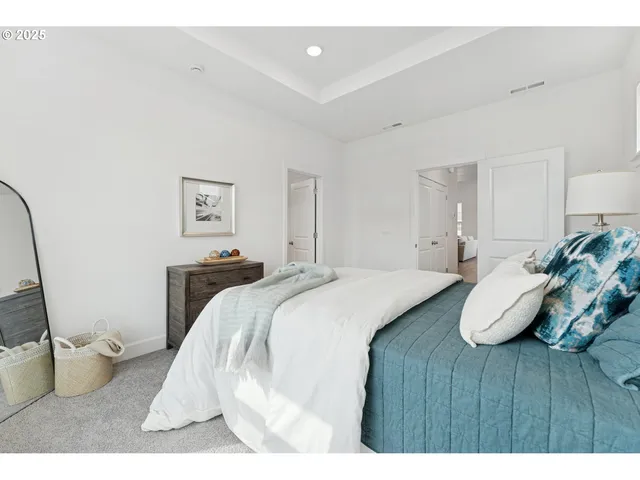 a bed room with a bed and a couch