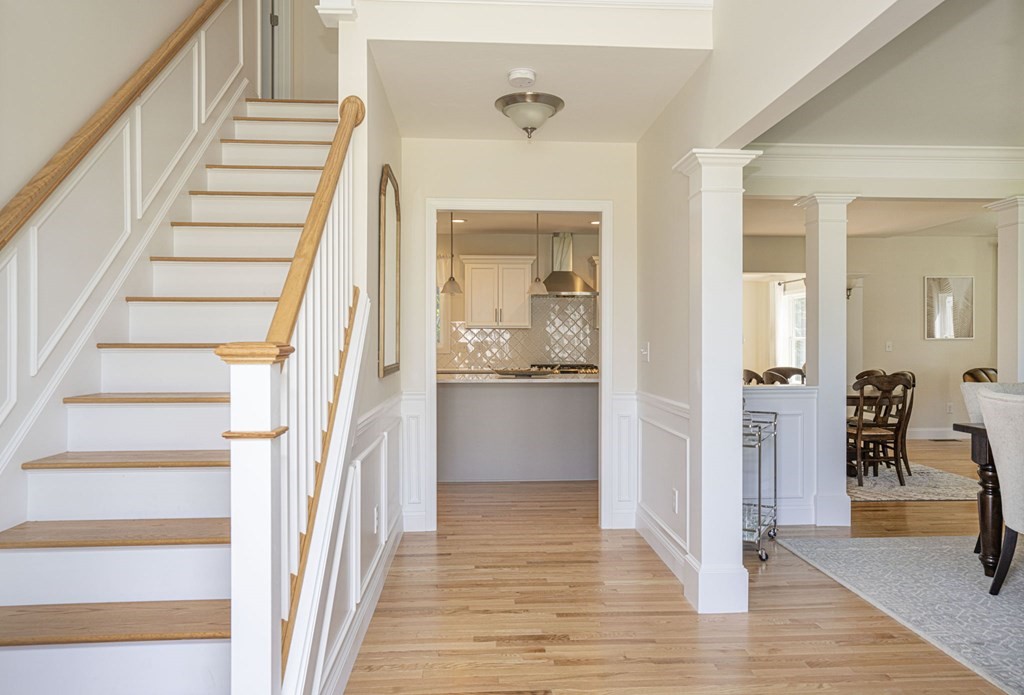 33 Clapp Road Rochester, MA 02770 - Photo 2 of 19 a view of a hallway view with wooden floor and staircase